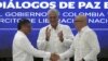 ARCHIVO - El presidente de Cuba, Miguel Díaz-Canel, aplaude mientras el presidente de Colombia, Gustavo Petro, a la izquierda, y el comandante del ELN, Antonio García, se dan la mano durante la firma de un acuerdo de alto el fuego bilateral en Cuba, 9 de junio de 2023.