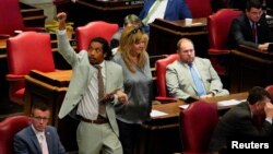 FILE: State Representative Justin Jones reenters the House Chamber after the Republican majority Tennessee House of Representatives voted to expel him and Justin Pearson for a gun control demonstration in Nashville, Tennesee,. April 10, 2023. 