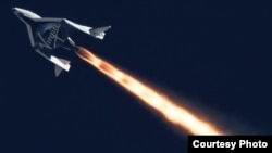 Virgin Galactic's SpaceShipTwo is seen flying over the Mojave Desert in California on Sept. 5, 2013.