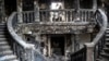 FILE - The Mariupol theater sits damaged after being bombed in Mariupol, Ukraine, on April 4, 2022.