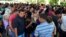 A general view shows migrants from Central America and Cuba waiting to be registered for humanitarian visas to cross the country on their way to the United States, in Acacoyagua, in Chiapas state, Mexico, March 27, 2019.