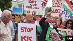 Demonstrators call for the end to Islamic State of Iraq and Syria (ISIS) terrorism during a Kurdish demonstration in front of the White House, file photo. 