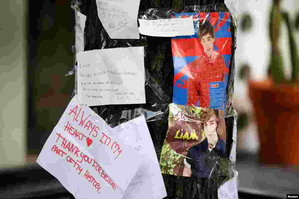 Tributes are left outside the hotel where Liam Payne, former One Direction band member, was found dead after he fell from a third-floor hotel room balcony, in Buenos Aires, Argentina.