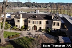 In this photo taken Thursday, Nov. 21, 2019, the French-style inspired main building of the Chateau Ste. Michelle winery is seen in Woodinville, Washington.