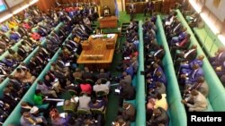 FILE - Ugandan lawmakers gather in the parliament in Kampala, Sept. 21, 2017. Onesmus Twinamatsiko, a member of national parliament, argued in favor of wife beating, on a national TV outlet on March 8.