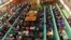 FILE - Ugandan lawmakers gather in the parliament to debate a move to change the constitution to extend the president's rule, in Kampala, Uganda, Sept. 21, 2017.