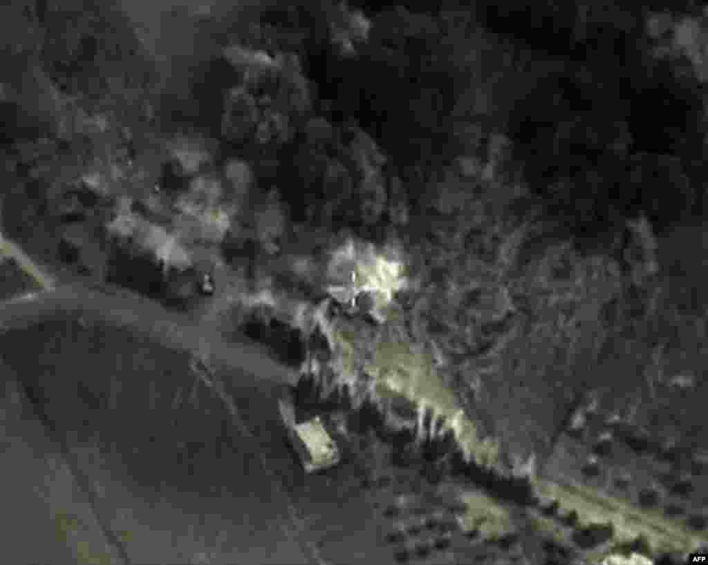 A video grab from Sept. 30, 2015, shows an image made available on the Russian Defense Ministry's official website, purporting to show an airstrike in Syria.