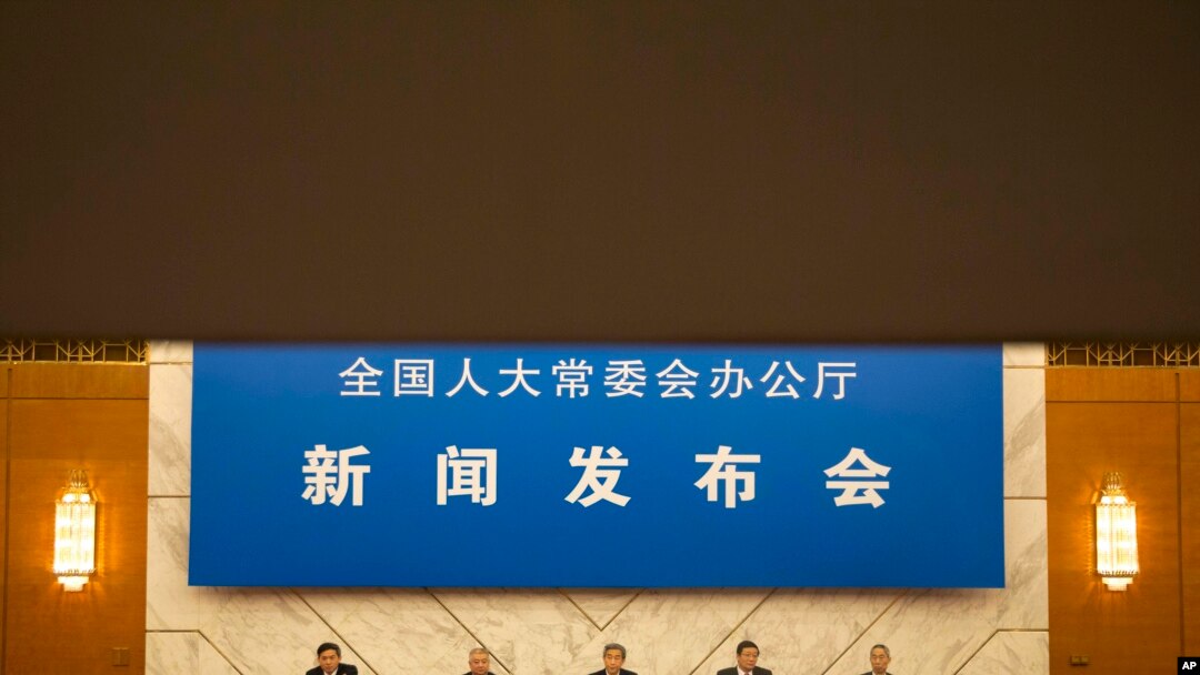 Para pejabat China dalam konferensi pers Panitia Tetap Kongres Rakyat Nasional (NPC) di Beijing,31 Agustus 2014.