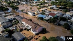 FILE - Aerial view of floods in Eldorado do Sul, Rio Grande do Sul state, Brazil, taken on May 9, 2024. (Photo by Nelson Almeida/AFP)