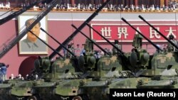 China, Beijing, Anti-aircraft artilleries drive past Tiananmen Gate during a military parade to mark the 70th anniversary of the end of World War Two