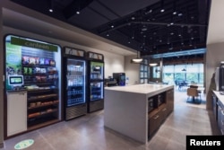 New touchless payment terminals for snack and vending machines are seen at Canteen's headquarters in Charlotte, North Carolina, U.S. in this undated handout image. Canteen is a division of Compass Group. (Canteen/Handout via Reuters)