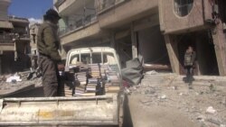 Books are rescued from a bombed and abandoned building to be taken to a secret library in the town of Daraya, Syria. (Photo courtesy of Daraya Council Media Team)