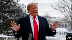 President Donald Trump talks with reporters on the South Lawn of the White House before departing for the American Farm Bureau Federation's 100th Annual Convention in New Orleans, Jan. 14, 2019, in Washington.