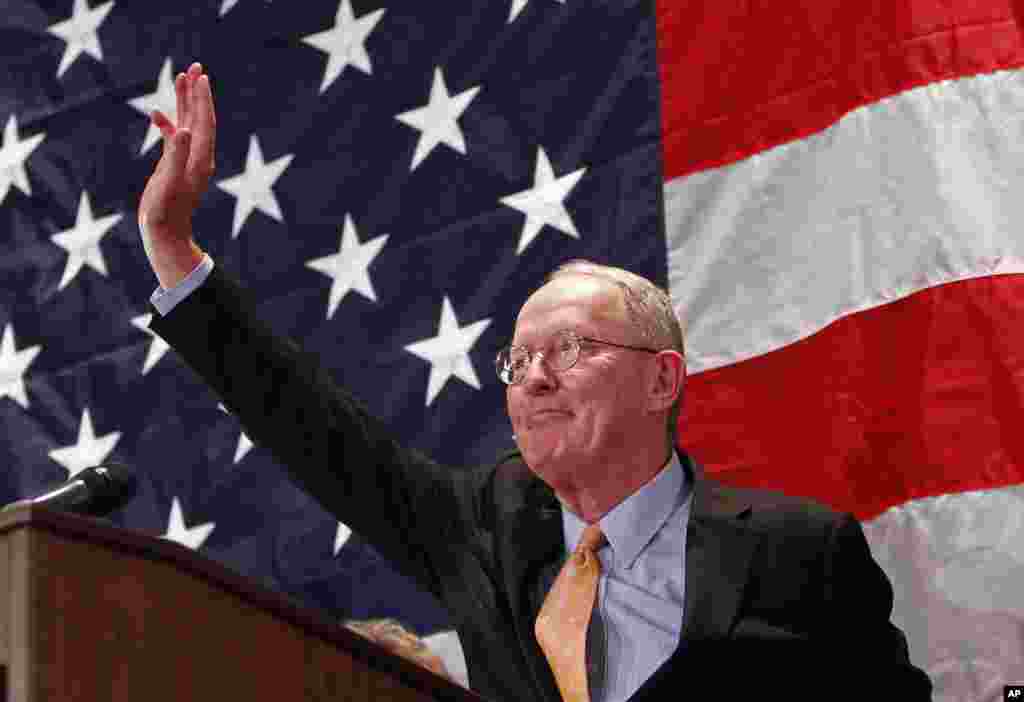 Sen. Lamar Alexander, R-Tenn. waves after speaking to supporters, Nov. 4, 2014, in Knoxville, Tenn.