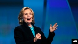 Former Secretary of State Hillary Rodham Clinton speaks at the Massachusetts Conference for Women in Boston, Dec. 4, 2014.