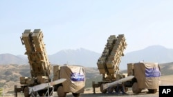 FILE - This photo released by the official website of the Iranian Defense Ministry, June 9, 2019, shows the Khordad 15, a new surface-to-air missile battery, at an undisclosed location in Iran.