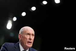 Director of National Intelligence Dan Coats testifies before the Senate Intelligence Committee hearing about worldwide threats, on Capitol Hill, in Washington, Jan. 29, 2019.