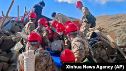 First responders perform rescue work after an earthquake at a village in Changsuo Township of Dingri County in Xigaze, southwest China's Tibet Autonomous Region, Jan. 7, 2025.