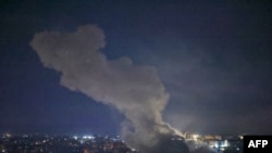 Smoke rises from the site of an Israeli airstrike targeting a neighborhood in southern Beirut on Nov. 13, 2024, amid the war between Israel and Hezbollah.