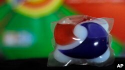 FILE - A miniature packet of laundry detergent is seen in a May 24, 2012, photo.