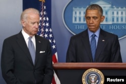 President Barack Obama (R) delivers remarks in reaction to the shootings in Charleston, from White House, June 18, 2015.