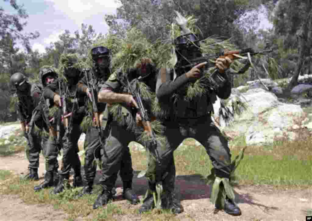 Palestinian members of the National Security Forces loyal to President Mahmoud Abbas take part in a training session in the West Bank city of Jenin, Thursday, March 29, 2012. As Arab leaders gather for a summit in Baghdad, Palestinian Authority President
