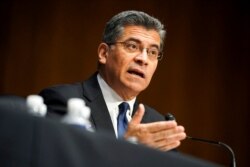 FILE - Xavier Becerra testifies during a hearing on his nomination to be secretary of Health and Human Services, on Capitol Hill, Feb. 24, 2021.