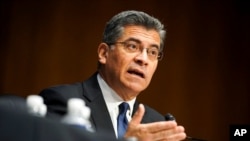 FILE - Xavier Becerra testifies during a hearing on his nomination to be secretary of Health and Human Services, on Capitol Hill, Feb. 24, 2021.