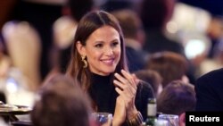 FILE Actor Jennifer Garner claps during the 32nd American Cinematheque Award ceremony honoring Bradley Cooper in Beverly Hills, California, Nov. 29, 2018. 