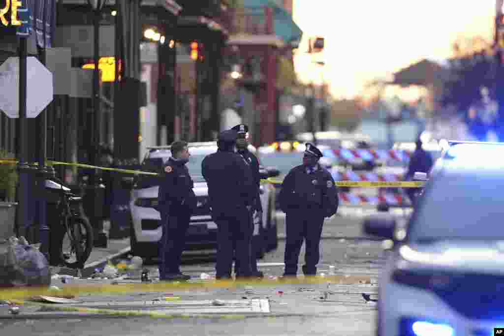 Emergency services attend the scene on Bourbon Street after a vehicle drove into a crowd on New Orleans' Canal and Bourbon Street, Jan. 1, 2025.