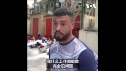 大批涌入休达的移民在海滩露宿