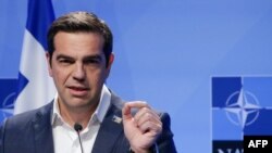 Le Premier ministre grec, Alexis Tsipras, donne une conférence de presse à Bruxelles, le 12 juillet 2018