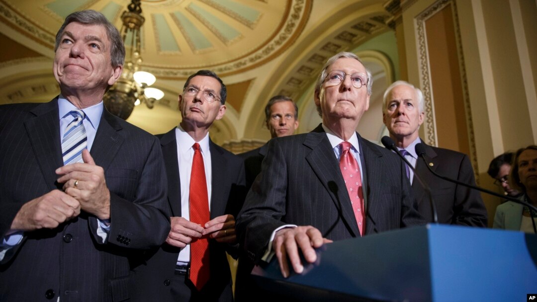 Senate Republican leaders, from left, Sen. Roy Blunt, R-Mo., Sen. John Barrasso, R-Wyo., Sen. John Thune, R-S.D., Senate Minority Leader Mitch McConnell, R-Ky., and Senate Minority Whip John Cornyn, R-Texas, meet with reporters, at the Capitol in Washington, July 29, 2014.