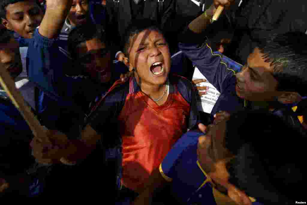 Nepalese students take part in protest to show solidarity against the border blockade in Kathmandu, Nepal.