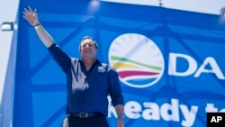 FILE - Main opposition Democratic Alliance (DA) party leader John Steenhuisen waves to supporters in Pretoria, South Africa, on Feb. 17, 2024, at the party's manifesto launch ahead of the 2024 general elections.