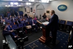 President Donald Trump speaks during a news conference at the White House, July 22, 2020, in Washington.