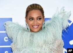FILE - Beyonce Knowles arrives at the MTV Video Music Awards at Madison Square Garden, in New York, Aug. 28, 2016.