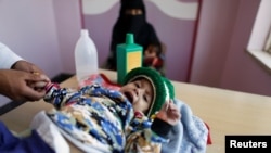 A girl is being treated at a malnutrition treatment center in Sanaa, Yemen, Nov. 4, 2017. 