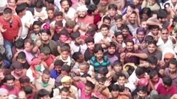 Thousands Celebrate Holi in India With Sweets Despite Coronavirus Surge 