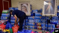 En la imagen, la Iglesia del Sagrado Corazón en McAllen, Texas, en la frontera con México, que asiste a menores migrantes.