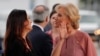 Stephanie Grisham, spokesperson for first lady Melania Trump, reacts with White House senior advisor Kellyanne Conway (R) after arriving for a campaign rally with U.S. President Donald Trump in Orlando, Florida, U.S., June 18, 2019.