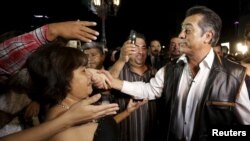 FILE - Jaime Rodriguez greets people after his swearing-in ceremony as the governor of Nuevo Leon state in Monterrey, Mexico, early on Oct. 4, 2015.