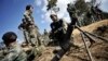 FILE - Kachin rebels are seen manning their positions at near Mai Ja Yang, Kachin state.