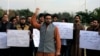 Supporters of the Pashtun Tahafuz Movement (PTM) chant slogans against the murder of a senior police officer after he disappeared from Pakistan's capital city last month, during a protest in Islamabad, Pakistan Nov.15, 2018. 