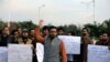 Supporters of the Pashtun Tahafuz Movement (PTM) chant slogans against the murder of a senior police officer after he disappeared from Pakistan's capital city last month, during a protest in Islamabad, Pakistan Nov.15, 2018. 