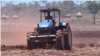A tractor tills land at Magutu farm in Mazowe district, about 40 km (25 miles) north of Zimbabwe's capital Harare, Nov. 12, 2018, ahead of the rainy season, expected any time now. (C. Mavhunga/VOA)