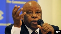 FILE - Former president of Botswana Festus Mogae speaks on March 28, 2011 in Abuja.