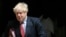 资料照片：英国首相约翰逊离开唐宁街10号，前往参加每周在议会举行的首相问答会。(2020年7月15日)