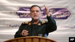 FILE - Gen. Abbas Nilforushan of Iran's Islamic Revolutionary Guard Corps addresses a meeting in Tehran, Feb. 5, 2024. Nilforushan died in an Israeli airstrike that killed Hezbollah leader Hassan Nasrallah in Beirut, Lebanon. Iran said Oct. 11 that it had recovered his body.