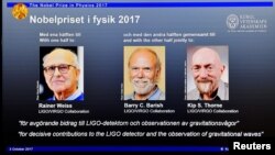 The names of Rainer Weiss, Barry C. Barish and Kip S. Thorne are displayed on the screen during the announcement of the winners of the Nobel Prize in Physics 2017, in Stockholm, Sweden, October 3, 2017. TT News Agency/Jessica Gow via REUTERS 